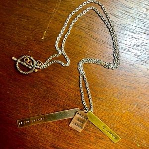 Necklace with three metal tags